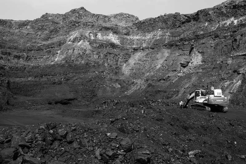 Coal being extracted from an open cast mine in Jharia Coal Fields in Dhanbad district, Jharkhand - mining is one of the top sectors causing large-scale deforestation and environmental destruction in India